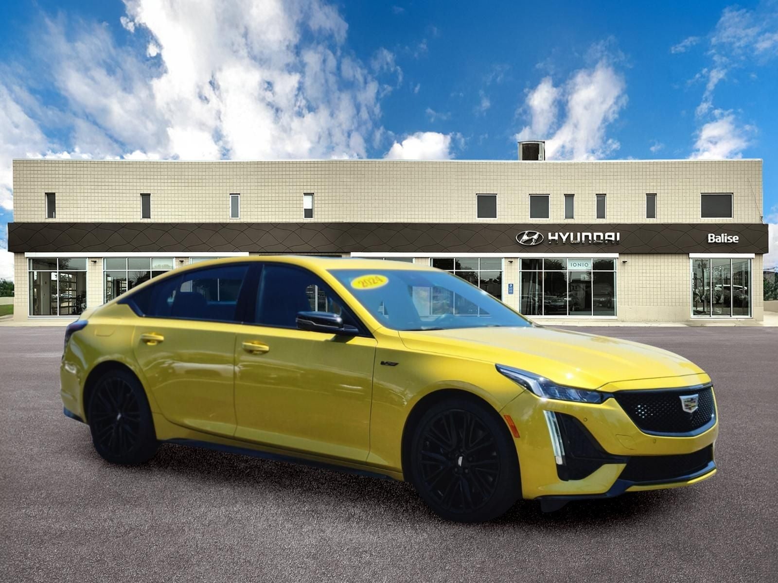2024 Cadillac CT5 V-Series Onyx Package in Cyber Yellow Metallic — front three-quarter view