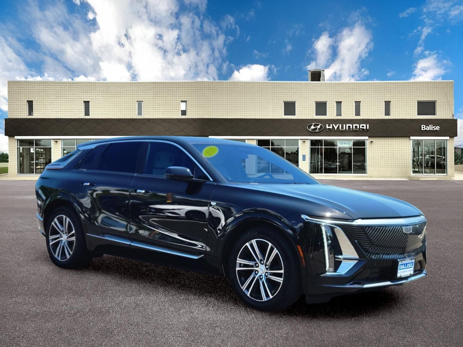 2024 Cadillac LYRIQ Luxury in Stellar Black Metallic — front three-quarter view