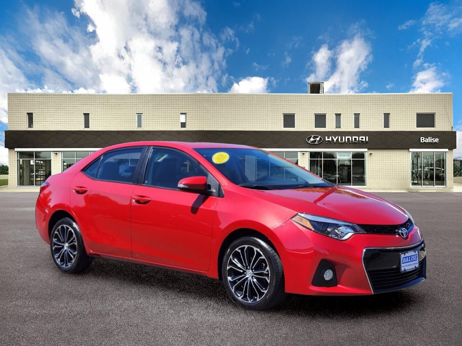 2016 Toyota Corolla S in Barcelona Red Metallic — front three-quarter view