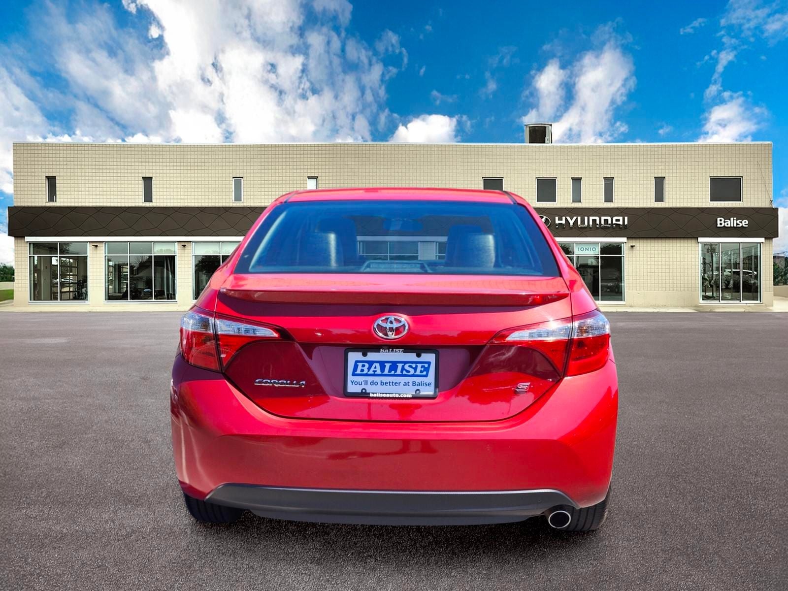 2016 Toyota Corolla — rear three-quarter view