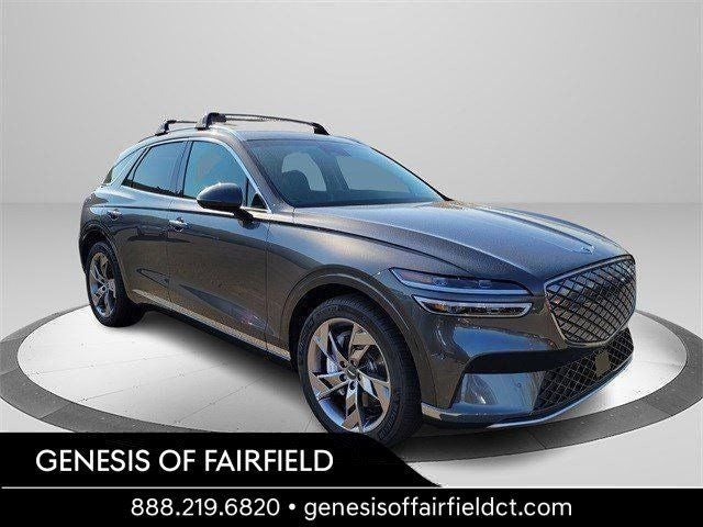 2025 Genesis Electrified GV70 Advanced in Makalu Gray — front three-quarter view