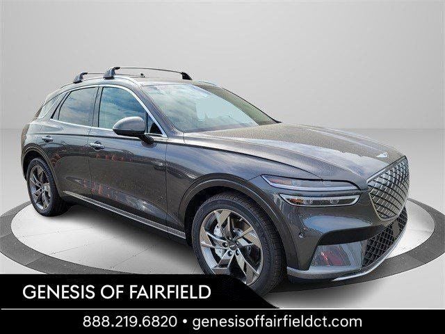 2025 Genesis Electrified GV70 Advanced in Makalu Gray — front three-quarter view