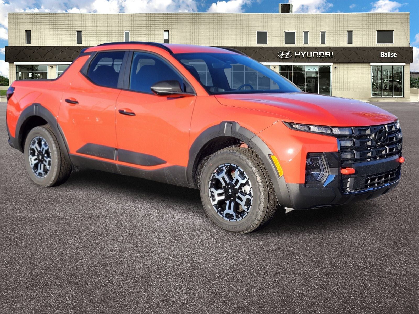 2026 Hyundai SANTA CRUZ XRT in Canyon Red — front three-quarter view