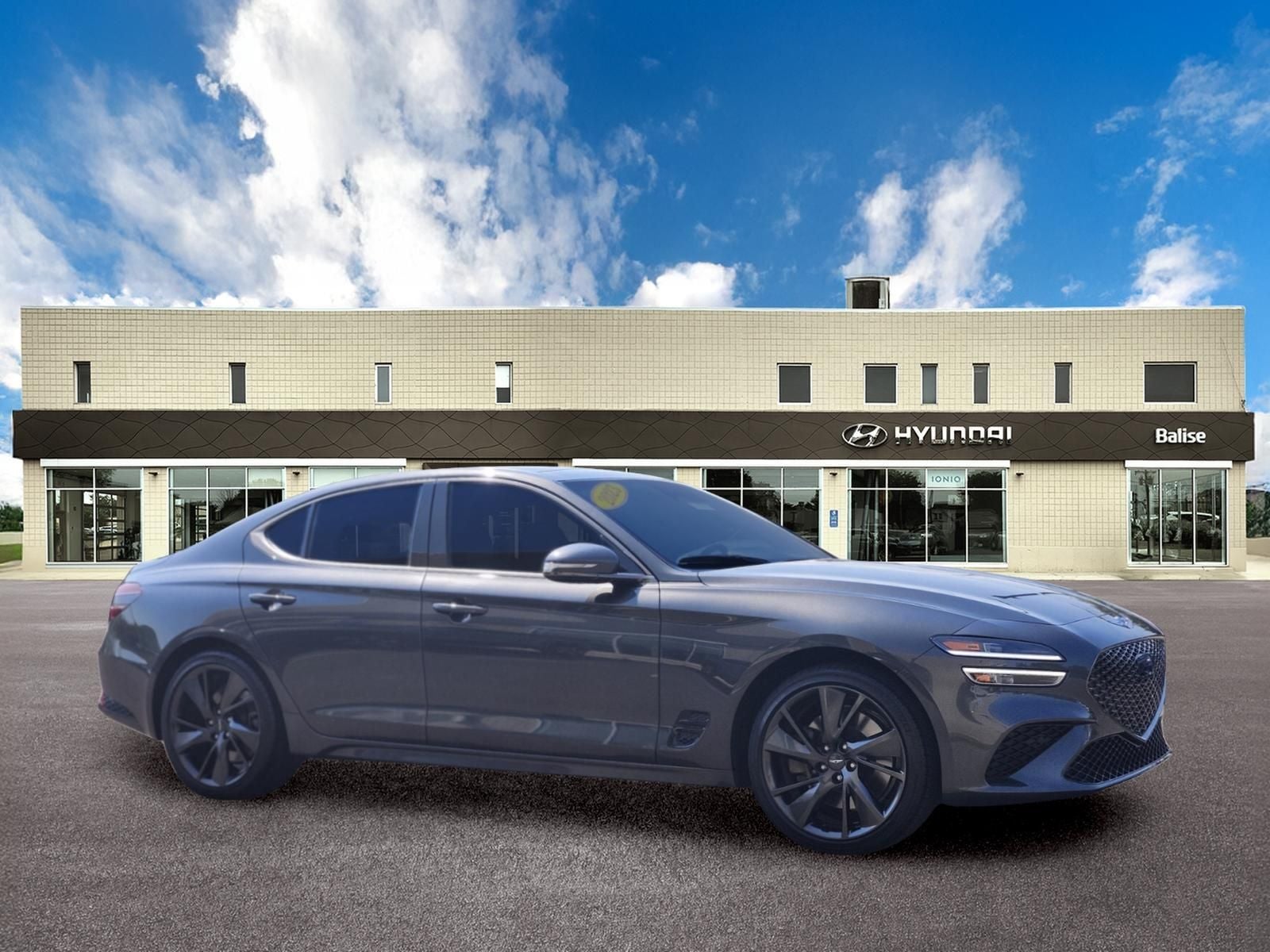 2023 Genesis G70 3.3T SPORTS ADVANCED in Makalu Gray — front three-quarter view