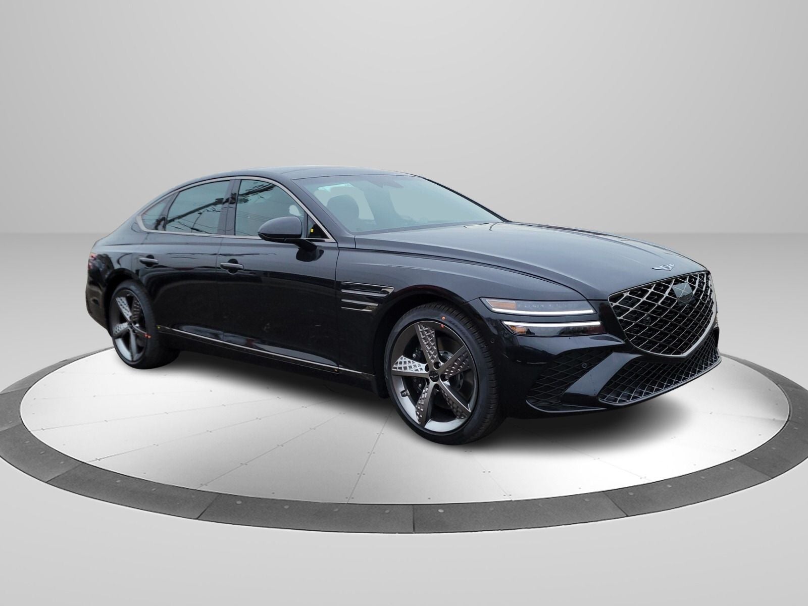 2025 Genesis G80 2.5T Prestige in Vik Black — front three-quarter view