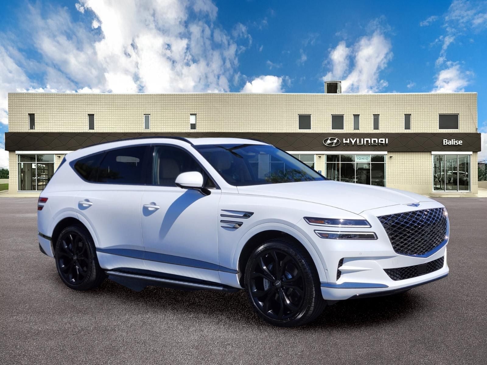 2024 Genesis GV80 3.5T Prestige Signature in Matterhorn White — front three-quarter view