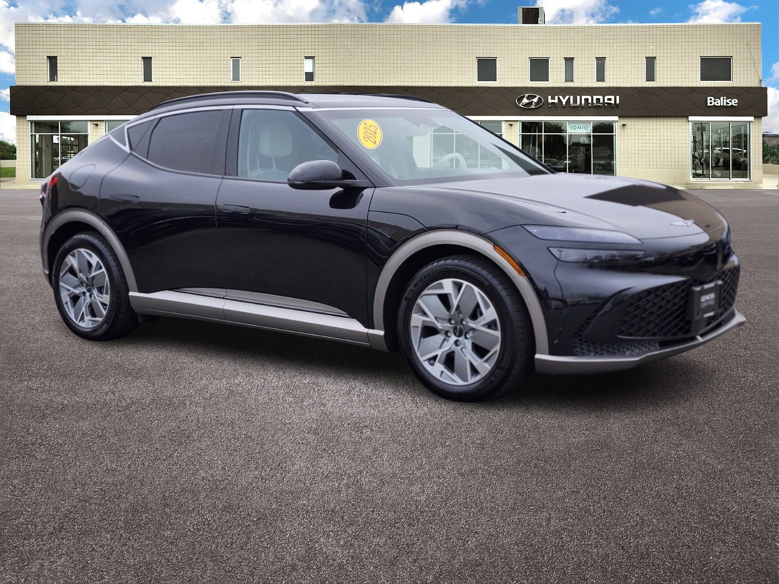 2025 Genesis GV60 Standard in Vik Black — front three-quarter view